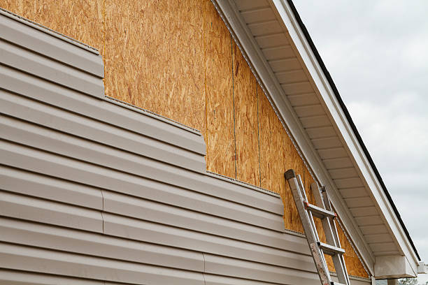 Professional Emergency Siding Repair technician working in Fishertown, PA